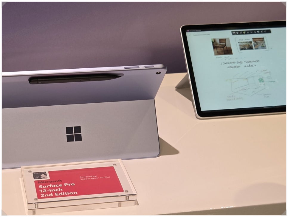 Surface Pro 12-inch 2nd Edition on display with a pen attached to its back and Ink Canvas on a second screen
